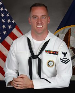 man in Navy uniform