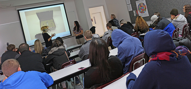 woman speaking to class