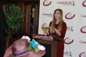 female student at podium